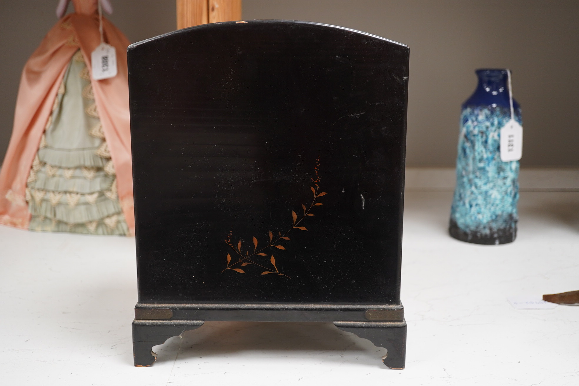 A late 19th early 20th century Japanese lacquer cabinet, 31cm high. Condition - exterior chipped and cracked near the top edge